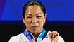 Asian Games Highlights, Day 5: Mirabai Ends Wait With Silver; Jay Meena, Skeet Teams, Men's Badminton Side Add Bronzes Dita Alangkara/AP Photo : Silver medalist Mirabai Chanu Saikhom of India poses on the podium after the women's 49kg weightlifting final at the Asian Games in Nagoya, Japan.