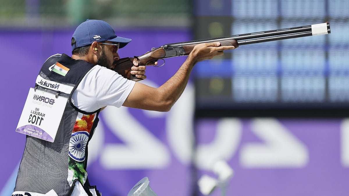 Anant Jeet Singh Naruka of India competes during the Skeet Men Individual qualification at the Asian Games in Toyota, Japan, Tuesday, Sept. 22, 2026. - (Kyodo News via AP)