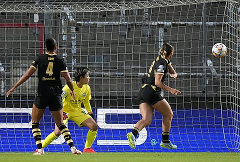 Manchester City's Kerstin Casparij, right, scores an own goal during the women's Champions League opening phase soccer match between FC Bayern Munich and Manchester City in Munich, Germany, Tuesday, Sept. 22, 2026. 