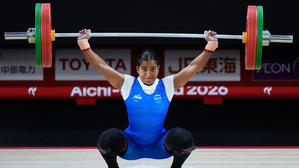 Gyaneshwari Yadav of India competes during the women's 53kg weightlifting final at the Asian Games in Nagoya, Japan, Wednesday, Sept. 23, 2026 - (AP Photo/Dita Alangkara)