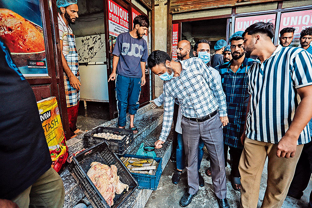 Authorities seize unhygienic rista and kababs from a distributor during a raid in Baramulla, Kashmir