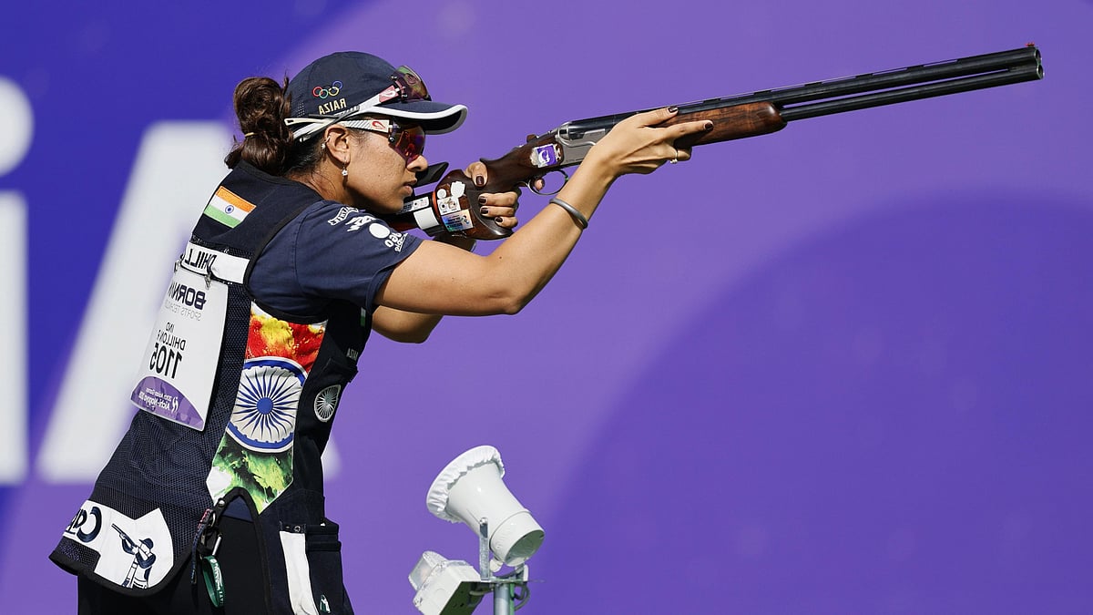 Raiza Dhillon of India competes during the Skeet Women Individual qualification at the Asian Games in Toyota, Japan, Tuesday, Sept. 22, 2026. - (Kyodo News via AP)