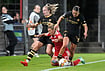 | Photo: AP/Matthias Schrader : Bayern's Linda Dallmann falls to the ground between Manchester City's Lauren Hemp, left, and Carlotta Wamser during the women's Champions League opening phase soccer match between FC Bayern Munich and Manchester City in Munich, Germany, Tuesday, Sept. 22, 2026. 