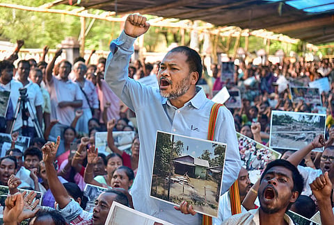 Raijor Dal MLA Akhil Gogoi along with flood-affected people stages a protest demanding compensation for the flood-hit people, in Guwahati, Assam.