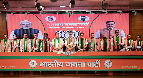 Union Minister of Parliamentary Affairs Kiren Rijiju addresses a press conference after eight Meghalaya MLAs joined the BJP, in New Delhi.