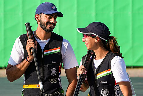 India’s Parinaaz Dhaliwal, right, and Anant Jeet Singh Naruka celebrate after securing bronze medal in the Skeet Mixed Team final match during the 20th Asian Games, in Nagoya, Japan, Thursday, Sept. 24, 2026. 
