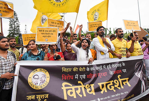 Jan Suraaj party workers and supporters stage a protest against Bihar government over the alleged sexual harassment of a minor girl by a group of people on a roadside in Jamui district, in Patna, Wednesday, Sept. 23, 2026. 