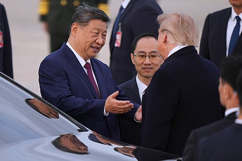 President Donald Trump and Chinese President Xi Jinping talk together at Joint Base Andrews, Md., Wednesday, Sept. 23, 2026.