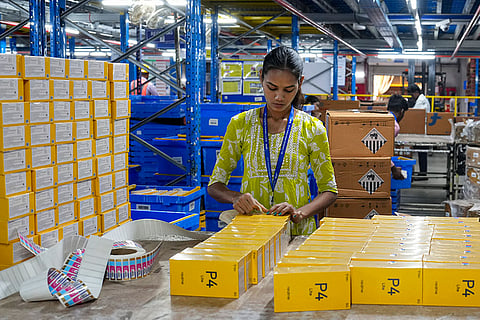 A worker sorts products at the Flipkart fulfillment center ahead of 'The Big Billion Days 2026' sale, in Bengaluru, Karnataka, Wednesday, Sept. 23, 2026.