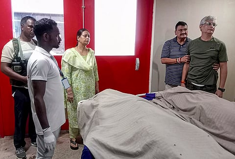 Ratnesh Kumar Singh, husband of Jharkhand minister Dipika Pandey Singh's daughter, who died after her vehicle rammed into a stationary truck, at a mortuary in Jamshedpur.