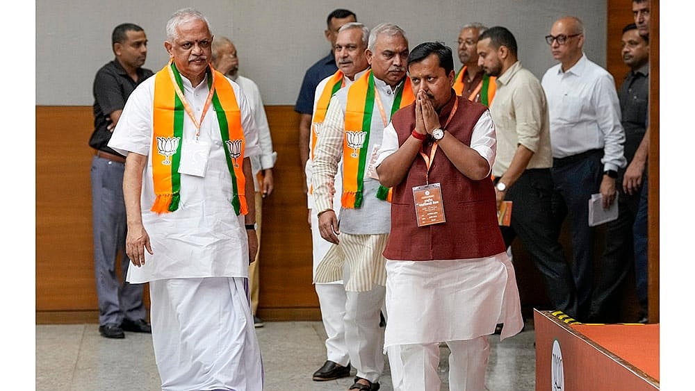 BJP National President and MP Nitin Nabin at party headquarters, in New Delhi. Party National General Secretary (Organisation) BL Santhosh, left, and others are also seen.  - File Photo| Photo: PTI/Ravi Choudhary