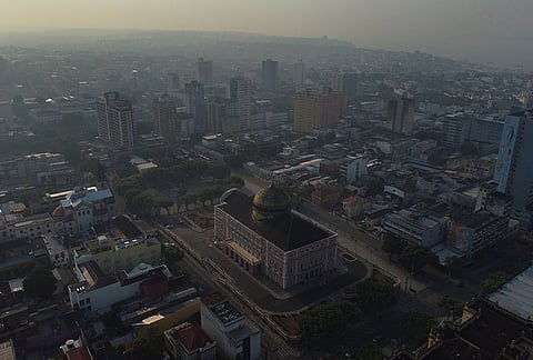 Smoke from wildfires fills the air in Manaus, Amazonas state, Brazil, Wednesday, Sept. 23, 2026. 