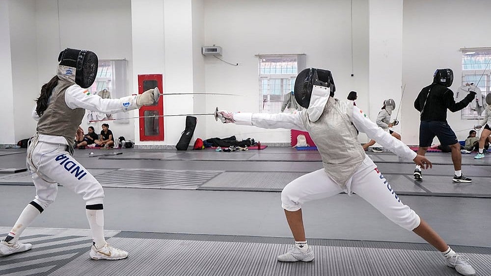 Fencers practicing during an interactive session with the media ahead of the Asian Games 2026 at Aichi-Nagoya, Japan, at Netaji Subhas National Institute of Sports (NSNIS), in Patiala, Punjab, Thursday, Sept. 3, 2026. 
 - | Photo: PTI/Shiva Sharma