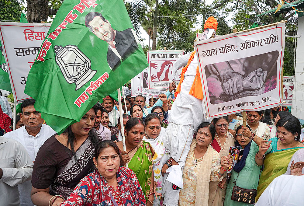 Rashtriya Janata Dal (RJD) activists stage a protest over the alleged sexual harassment of a minor girl at Bihar's Jamui, in Patna, Wednesday, Sept. 23, 2026.  - | Photo: PTI