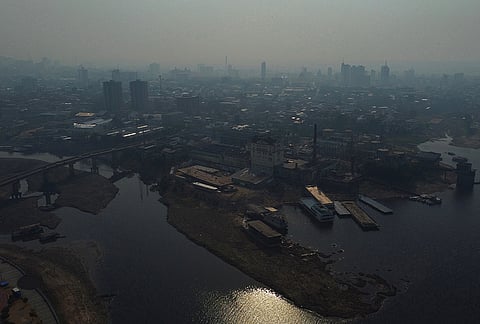 Smoke from wildfires fills the air in Manaus, Amazonas state, Brazil, Wednesday, Sept. 23, 2026. 