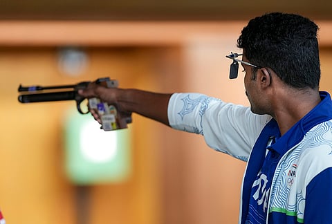 India’s Uchaganve Kedarling Balakrishna competes in the 10m Air Pistol Men’s qualification during the 20th Asian Games, in Nagoya, Japan.
