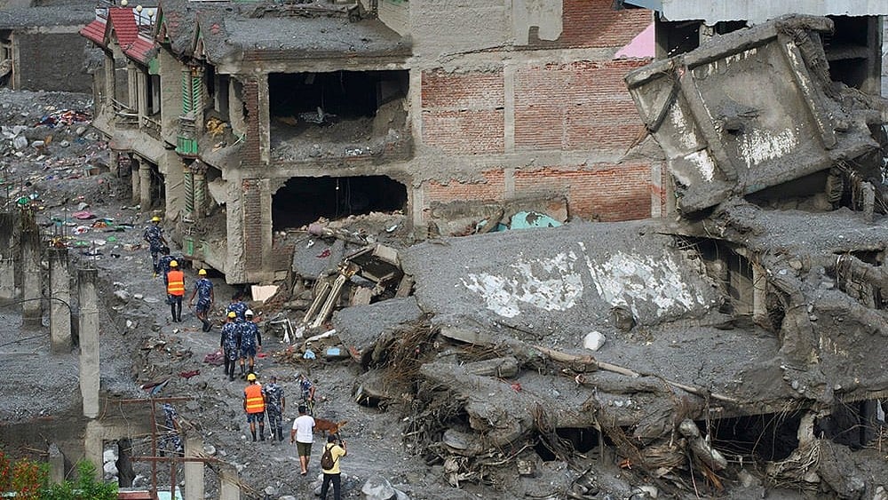 Aftermath of the Nepal floods - | Photo: AP/Niranjan Shrestha