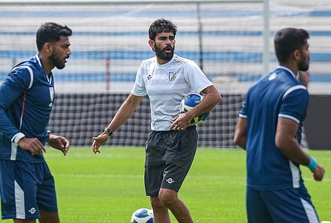 India's football team coach Khalid Jamil, right, with team players during a training session ahead of FIFA international friendly match between India and Panama, in Bengaluru, Karnataka, Thursday, Sept. 24, 2026. 