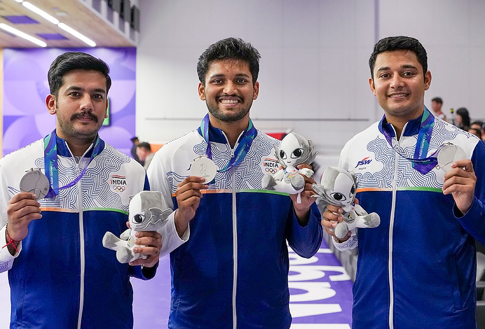 Aishwary Pratap Singh Tomar, left, Niraj Kumar, right, and Rudrankksh Patil