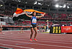 Seema Kumari Ends India’s 16-Year Wait With Asian Games 10,000m Bronze | Photo: PTI/Arun Sharma : India’s Seema holds the national flag as she celebrates after winning the bronze medal in the women's 10,000m final during the Asian Games 2026, in Nagoya, Japan, Thursday, Sept. 24, 2026.