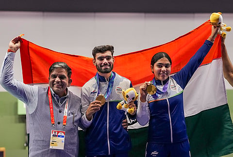 India’s Suruchi Singh, right, and Kamaljeet celebrate after winning Gold medal in the 10 meter air pistol mixed team final in the ongoing Asian Games 2026, in Nagoya, Japan, Friday, Sept. 25, 2026. 