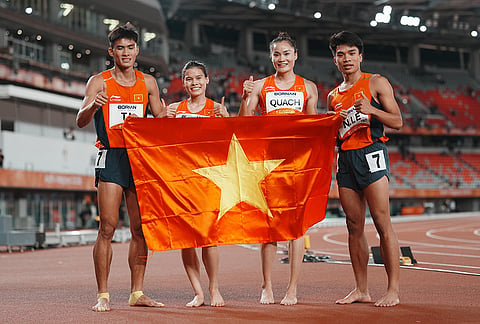 Athletes of team Vietnam pose after competing in the 4x400-meter relay mixed final at the Asian Games in Nagoya, Japan, Thursday, Sept. 24, 2026