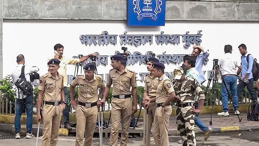 Police personnel stand guard outside IIT Bombay after the recent death by suicide of a second year B Tech student Sahil Wakode, in Mumbai, Tuesday, Sept. 22, 2026.  - | Photo: PTI