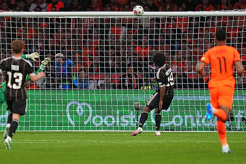 Germany's Karim Adeyemi misses a big chance alone in front of the goal during the UEFA Nations League soccer match between the Netherlands and Germany in Amsterdam, Netherlands.