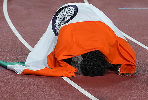 India's T K Vishal celebrates after winning the silver medal in the 4x400m mixed relay event during the Asian Games, in Nagoya, Japan, Thursday, Sept. 24, 2026. 