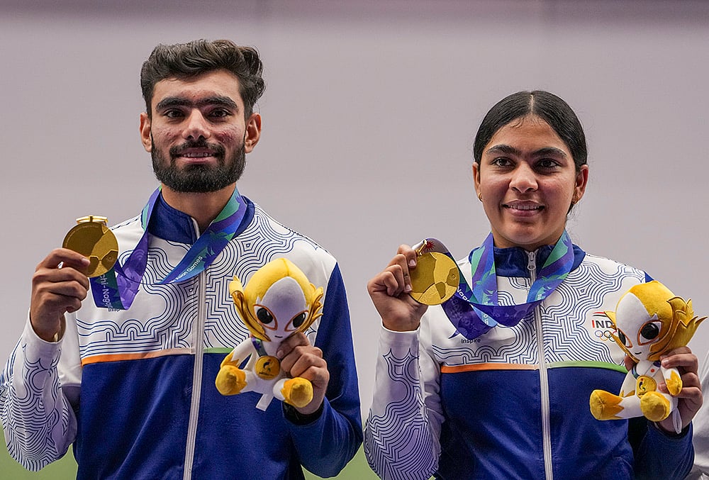 India’s Suruchi Singh, right, and Kamaljeet celebrate after winning Gold medal in the 10 meter air pistol mixed team final in the ongoing Asian Games 2026, in Nagoya, Japan, Friday, Sept. 25, 2026.  - | Photo: PTI/Atul Yadav