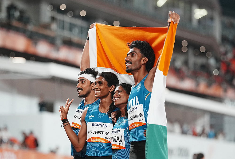 | Photo: AP/Lee Jin-man : From left, India's Manu Thekkinalil Saji, Poovamma Raju Machettira, Vithya Ramraj and Vishal Thennarasu celebrate after competing in the 4x400-meter relay mixed final at the Asian Games in Nagoya, Japan, Thursday, Sept. 24, 2026. 