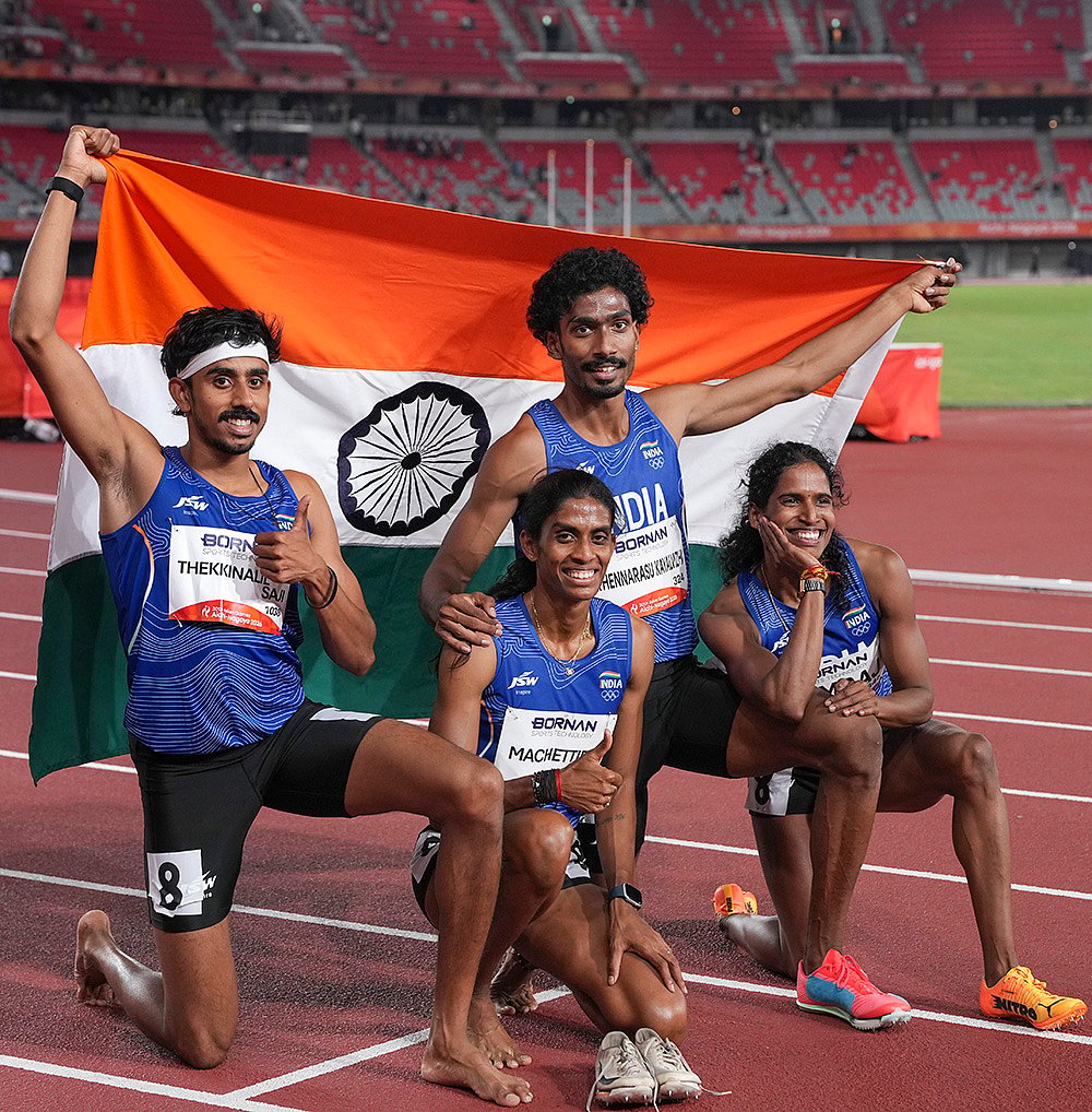 T S Manu, M R Poovamma, Vithya Ramraj, and T K Vishal celebrate after winning the silver medal