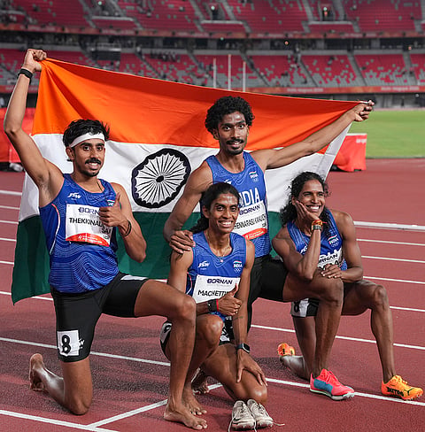 India's T S Manu, M R Poovamma, Vithya Ramraj, and T K Vishal celebrate after winning the silver medal in the 4x400m mixed relay event during the Asian Games, in Nagoya, Japan, Thursday, Sept. 24, 2026. 