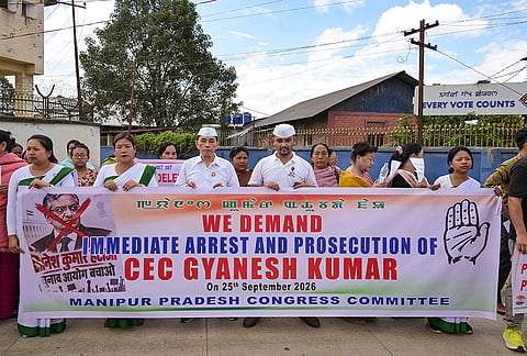 Manipur Pradesh Congress Committee (MPCC) leaders and members hold a banner and stage a protest outside the office of Chief Electoral Officer (CEO) against Chief Election Commissioner (CEC) Gyanesh Kumar, demanding his resignation and immediate arrest, in Imphal, Friday, Sept. 25, 2026. 