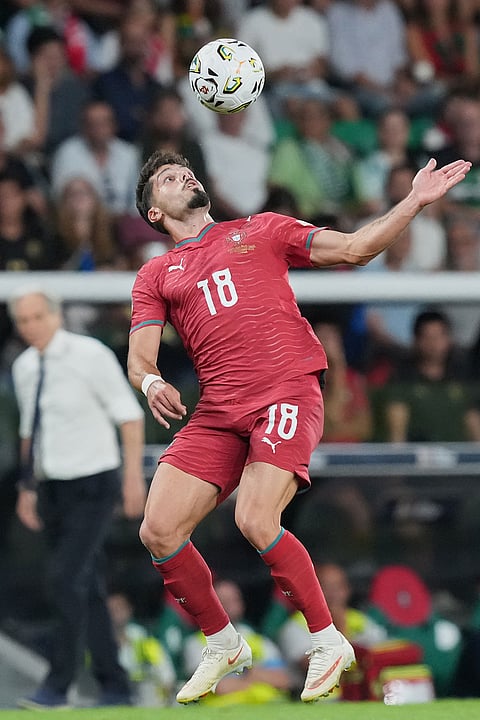 Portugal's Pedro Neto controls the ball during the Nations League soccer match between Portugal and Wales in Lisbon.