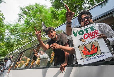 Indian Youth Congress (IYC) members stage a protest against Chief Election Commissioner (CEC) Gyanesh Kumar, demanding his resignation, citing a media report about objections reportedly raised by two Election Commissioners over various decisions of the poll panel, in New Delhi, Friday, Sept. 25, 2026. 