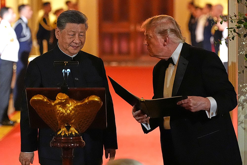 President Donald Trump talks with Chinas President Xi Jinping White House