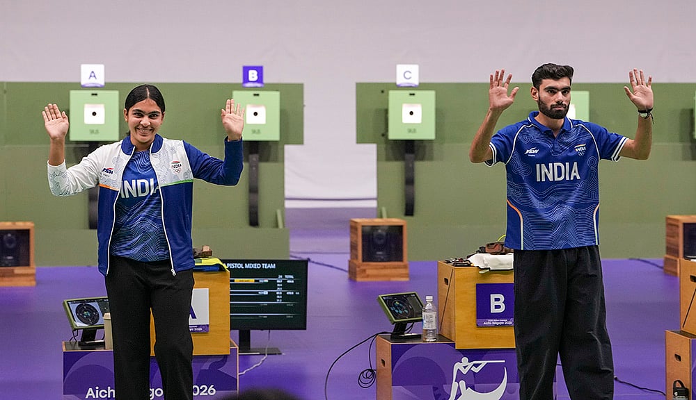 10m air pistol -India’s Suruchi Singh, left, and Kamaljeet celebrate after winning Gold medal
