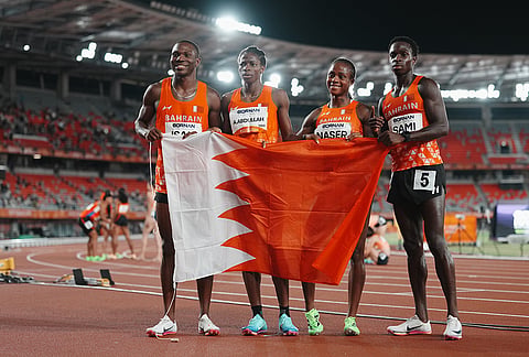From left, Bahrain's Musa Isah, Aisha Abdullah, Salwa Naser and Alaa Sami pose after competing in the 4x400-meter relay mixed final at the Asian Games in Nagoya, Japan, Thursday, Sept. 24, 2026.