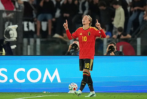 Belgium's Mika Godts celebrates after scoring the opening goal during the Nations League soccer match between Italy and Belgium in Rome, Friday, Sept. 25, 2026.
