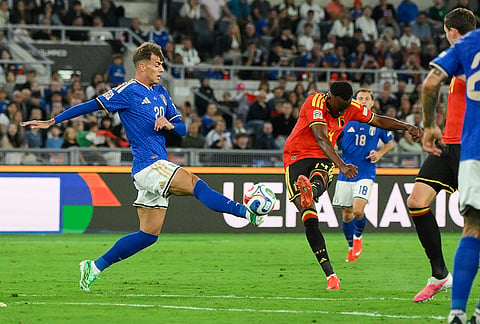 Belgium's Dodi Lukebakio, right,, scores his side's second goal during the Nations League soccer match between Italy and Belgium in Rome, Friday, Sept. 25, 2026.  