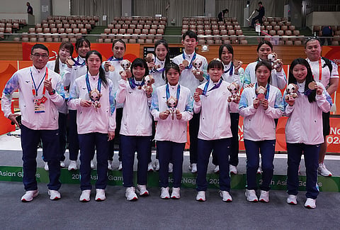 Bronze medalist, team Taiwan poses for a group photo after the women's kabaddi at the Asian Games in Tokai City, Japan, Saturday, Sept. 26, 2026. 