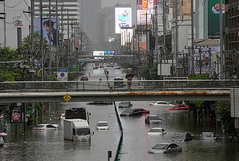 The streets are flooded after heavy rain in Bangkok, Thailand, Saturday, Sept. 26, 2026. 