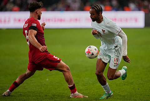 Turkey's Salih Ozcan, left, and France's Bradley Barcola fight for the ball during the UEFA Nations League soccer match between Turkey and France in Izmit, Turkey, Friday, Sept. 25, 2026. 
