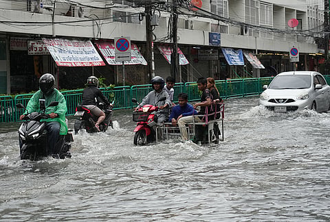 The streets are flooded after heavy rain in Bangkok, Thailand, Saturday, Sept. 26, 2026. 