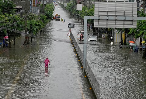 The streets are flooded after heavy rain, in Bangkok, Thailand, Saturday, Sept. 26, 2026. 