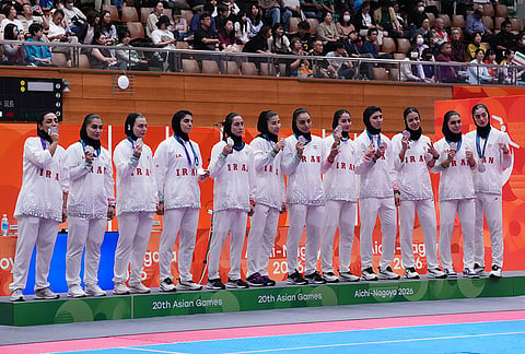 Silver medalist, team Iran poses on the podium after the women's kabaddi final at the Asian Games in Tokai City, Japan, Saturday, Sept. 26, 2026. 