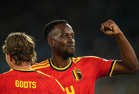 Belgium's Dodi Lukebakio celebrates with Mika Godts, left, after scoring his side's second goal during the Nations League soccer match between Italy and Belgium in Rome, Friday, Sept. 25, 2026. 