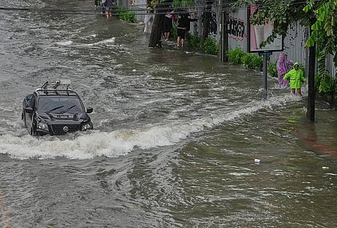 The streets are flooded after heavy rain in Bangkok, Thailand, Saturday, Sept. 26, 2026. 