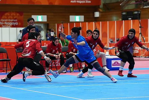India's Pushpa, center, attempts a tag during the women's kabaddi final at the Asian Games in Tokai City, Japan, Saturday, Sept. 26, 2026. 